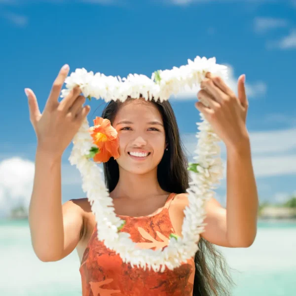 Tahitiana con recibimiento de flores
